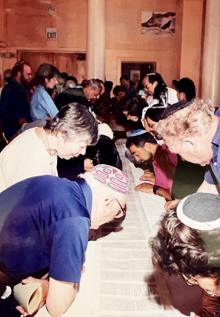 Congregants examine new Torah